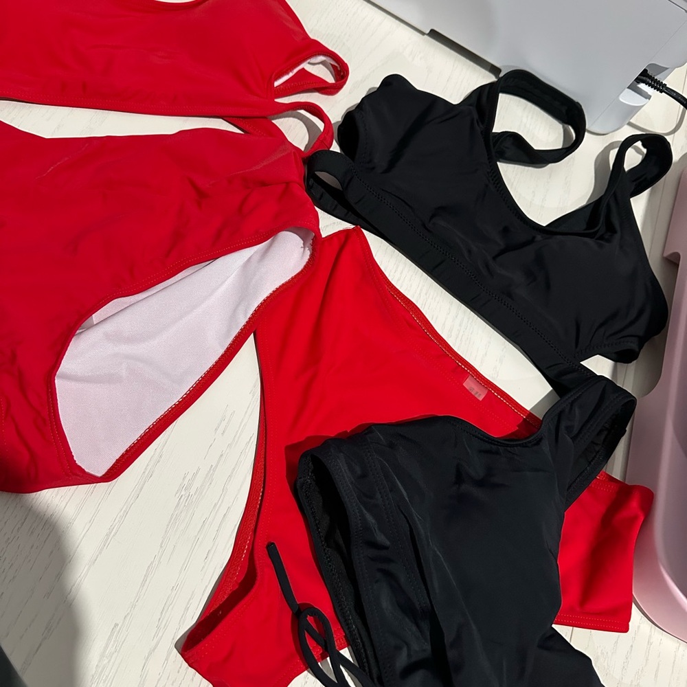 Women’s black and Red Swimsuits with an extra black top,